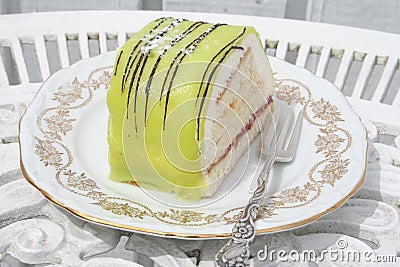 Pastry with green marzipan and cream Stock Photo