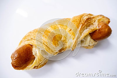 Pastry sausage puff on white Stock Photo