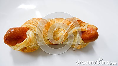 Pastry sausage puff on white Stock Photo