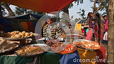 Pastry and sweet street seller in nepali fair Editorial Stock Photo