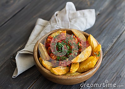 Patatas Bravas, baked potatoes with spicy tomato sauce Stock Photo