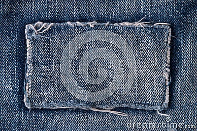 Patch on blue jeans Stock Photo