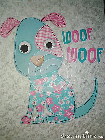 Patchwork puppy google eyes blue pink white black woof Stock Photo