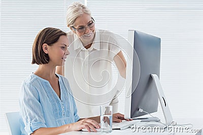 Pateint with doctor using computer Stock Photo