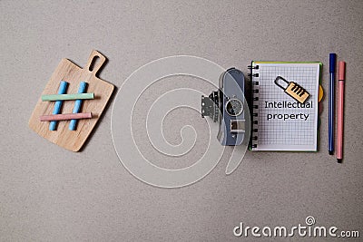 Patent , copyright or Intellectual protection concept: the lock lying on the pad of accessories for bloggers Stock Photo