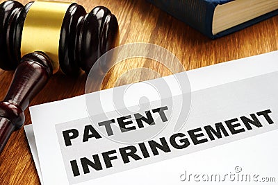 Patent infringement and gavel. Copyright law. Stock Photo