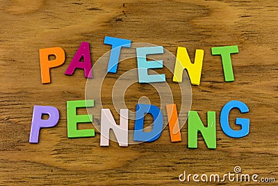 Patent pending sign business invention patented intellecual property copyright Stock Photo