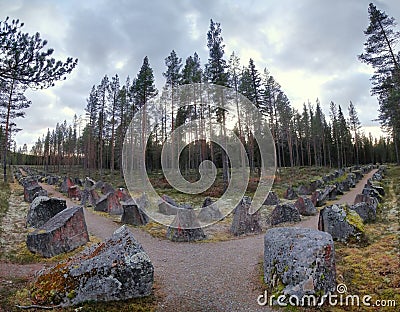 Path with antitank barriers near Saerna in Sweden. It is part of Skans 211, a historic fortification from WWII Stock Photo