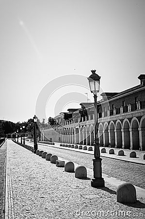 Path around the palatial building with a streetlight in foreground. Stock Photo