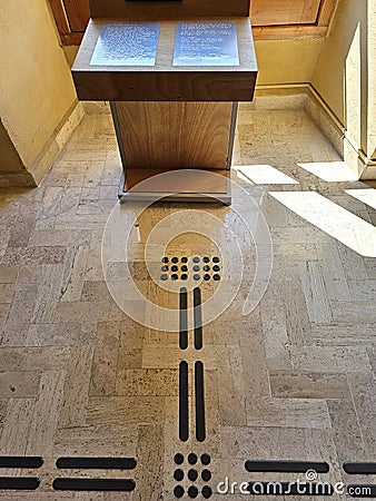 Path for blind or low vision with a textured podotactile surface, can recognize an obstacle, exit or stairs using their cane Editorial Stock Photo