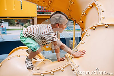 Path goal direction child boy park game concept Stock Photo