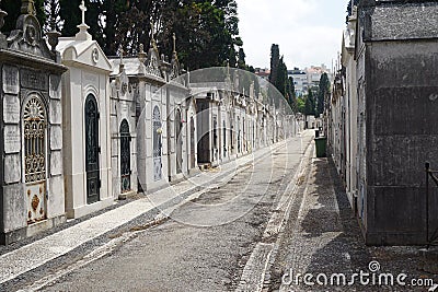 Path on Graveyard with very old graves Stock Photo