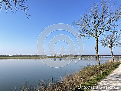 Path next to the river Nederrijn Stock Photo