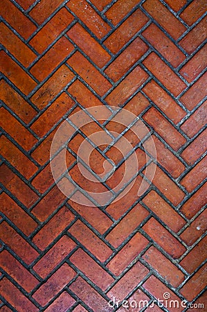 The path paved with red brick in herringbone pattern, Red stone walkway herringbone style pattern Stock Photo