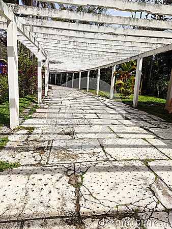 Path of stones with columns vertically and horizontal referring to the infinity Stock Photo