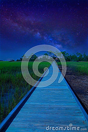 Path to unknown destination with milky way Stock Photo