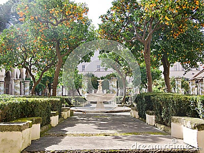 Pathway through a formal garden with fountain in Naples Stock Photo