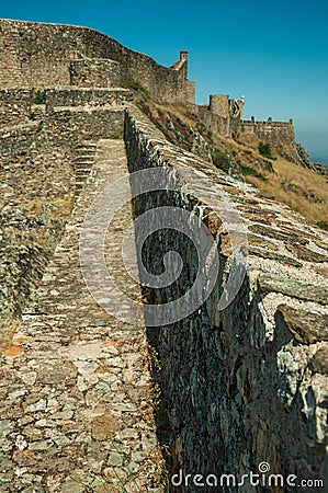 Pathway on wall and tower over rocky hill at the Marvao Castle Stock Photo