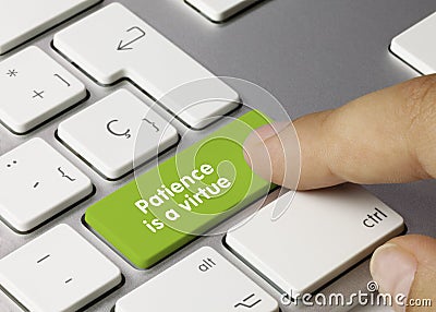 Patience is a virtue - Inscription on Green Keyboard Key Stock Photo