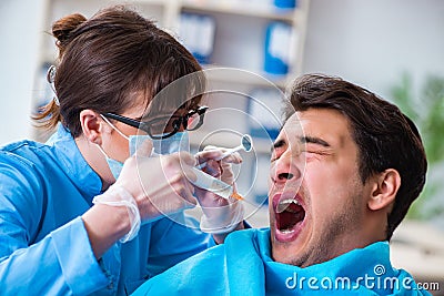 The patient afraid of dentist during doctor visit Stock Photo