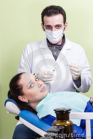 Patient afraid the dentist injection Stock Photo