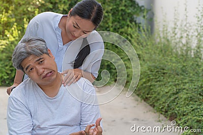 The patient is Cerebrovascular accident or stroke Caused by hypertension and obesity, sitting in wheelchair him mouse is facial pa Stock Photo