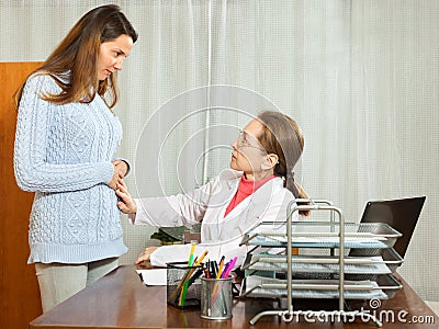 Patient complaining of pain in the abdomen doctor Stock Photo