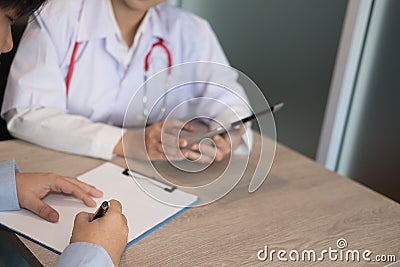 Patient complete questionaire in medical office. man fill out he Stock Photo