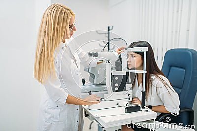 Patient on diagnostic of vision, oculist cabinet Stock Photo