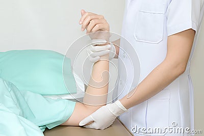 Patient doing physical exercises with physical therapist Stock Photo