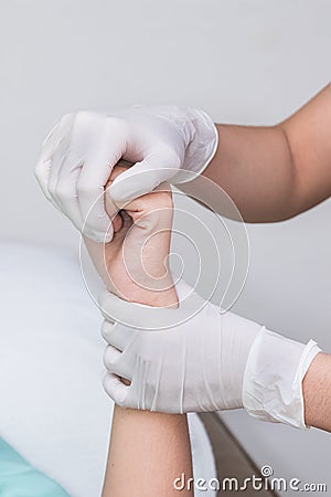 Patient doing physical exercises with physical therapist Stock Photo