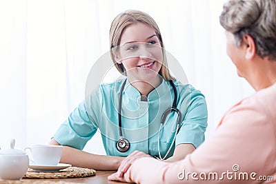 Patient during home medical consultation Stock Photo