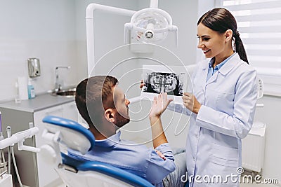 Patient looking at x-ray Stock Photo