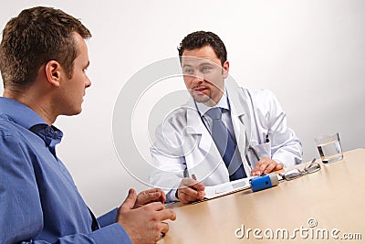 patient nad doctor conversation Stock Photo