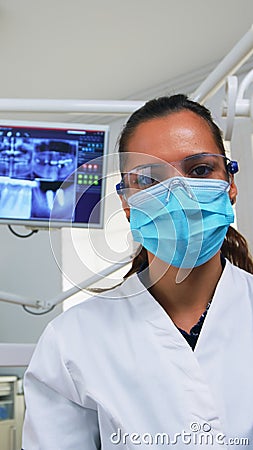Patient pov in dental chair making periodic teeth check Stock Photo