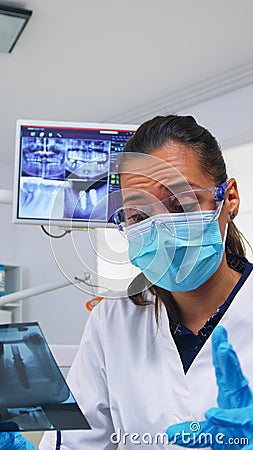 Patient pov in dental office explaining treatment of teeth cavit Stock Photo