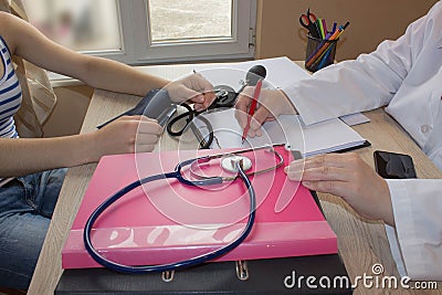 Patient in reception area of office of doctor or dentist Stock Photo