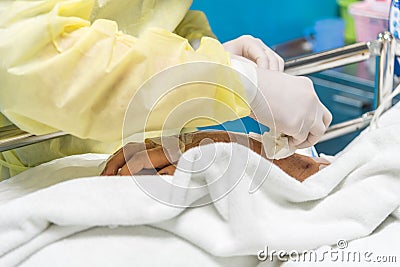 Patient relative taking care of the elder patient Stock Photo