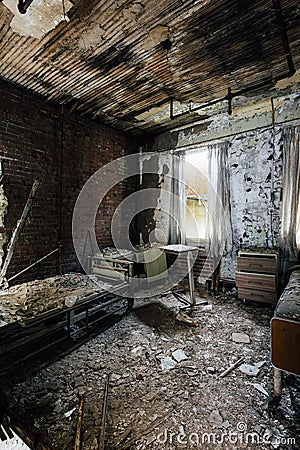 Patient Room - Abandoned Hospital & Nursing Home Stock Photo