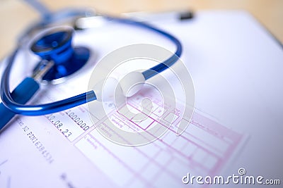 patient's medical history, stethoscope, drug prescription, in German PHARMACY NUMBER, significance medical documents Stock Photo