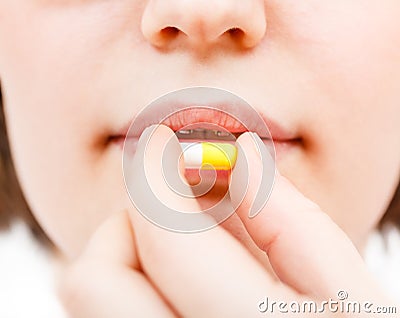 Patient takes pilule Stock Photo