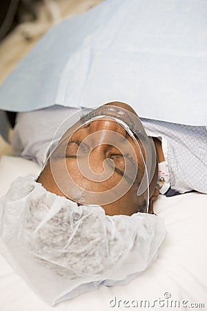 Patient Under Anaesthetic In Operating Theatre Stock Photo