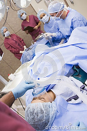 Patient undergoing egg retrieval procedure Stock Photo