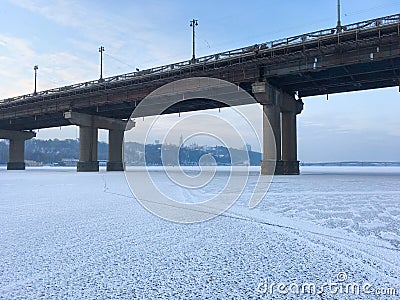 Paton bridge frozen Dnipro river Stock Photo