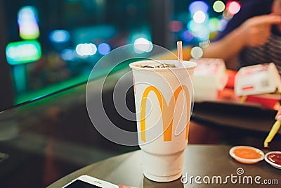 Patong, Thailand - February 22, 2019: Coca Cola paper cup, mcdonalds. Editorial Stock Photo