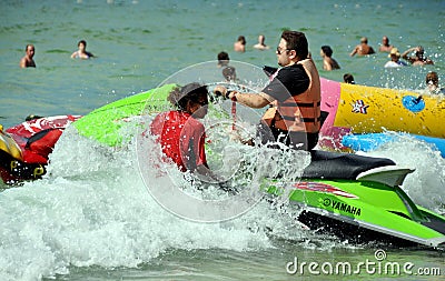 Patong, Thailand: Man on a Jet Ski Editorial Stock Photo