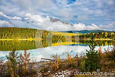 Patricia Lake amongst the forests and mountains Stock Photo