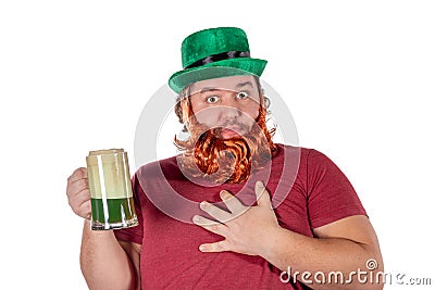 Patricks day party. Portrait of funny fat man holding glass of beer on St Patrick Stock Photo