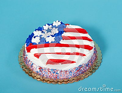 Patriotic American flag cake on blue Stock Photo