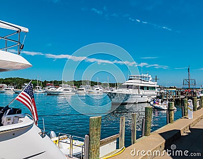 Patriotism with flag flying on boat at the cape in Martha`s Vineyard MA Editorial Stock Photo